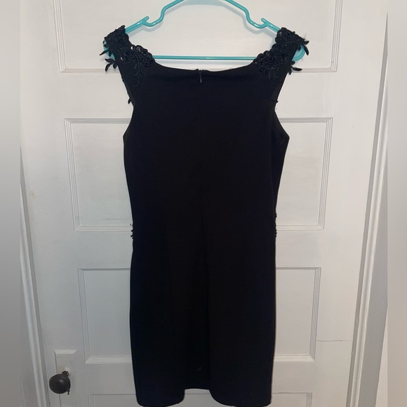 NIKIBIKI Off the Shoulder Black Mini Dress with Front Detailing - Picture 3 of 3
